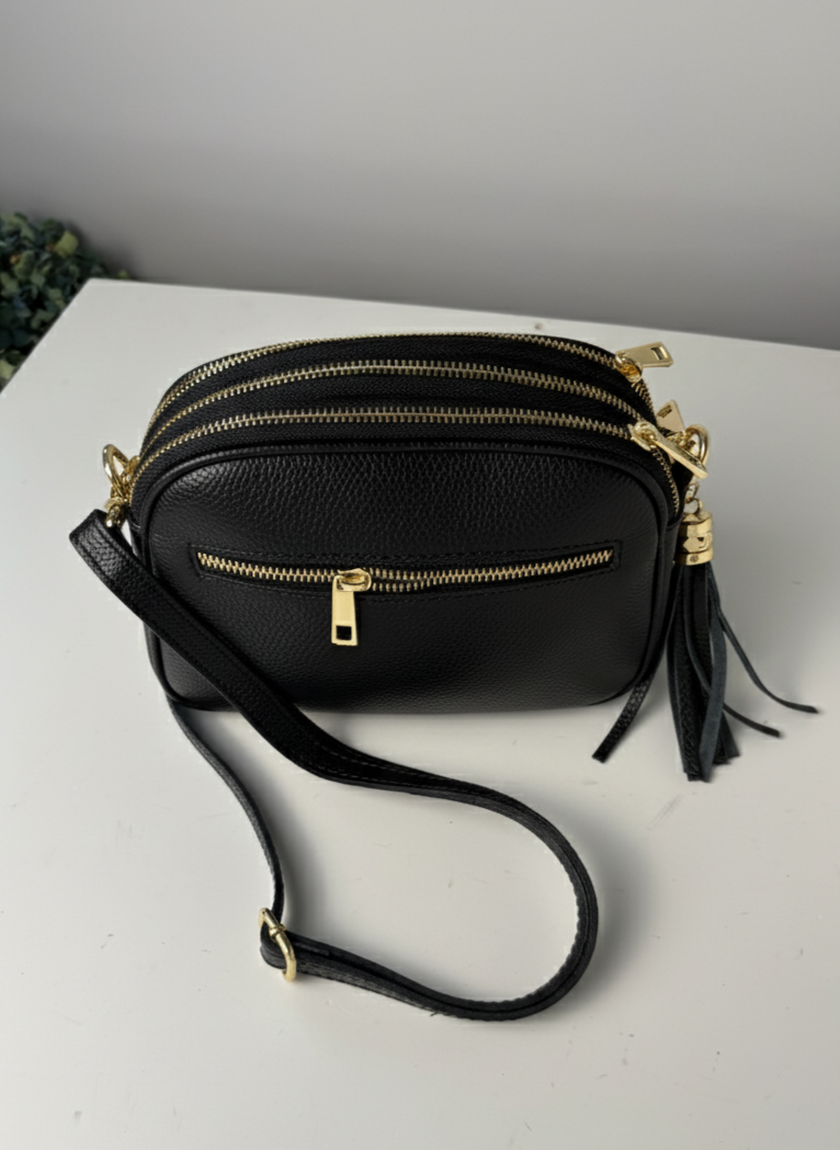 Borsa artigianale in pelle di camoscio e pelle di buccia d'arancia