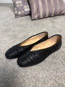 Ballerina in pelle nera effetto arricciato