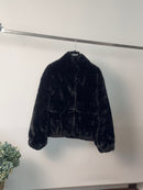 Bomber in ecopelliccia con tasche