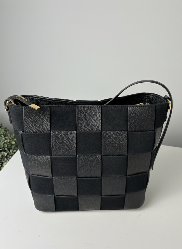 Borsa artigianale con design a scacchiera