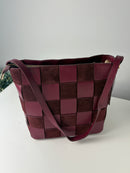 Borsa artigianale con design a scacchiera