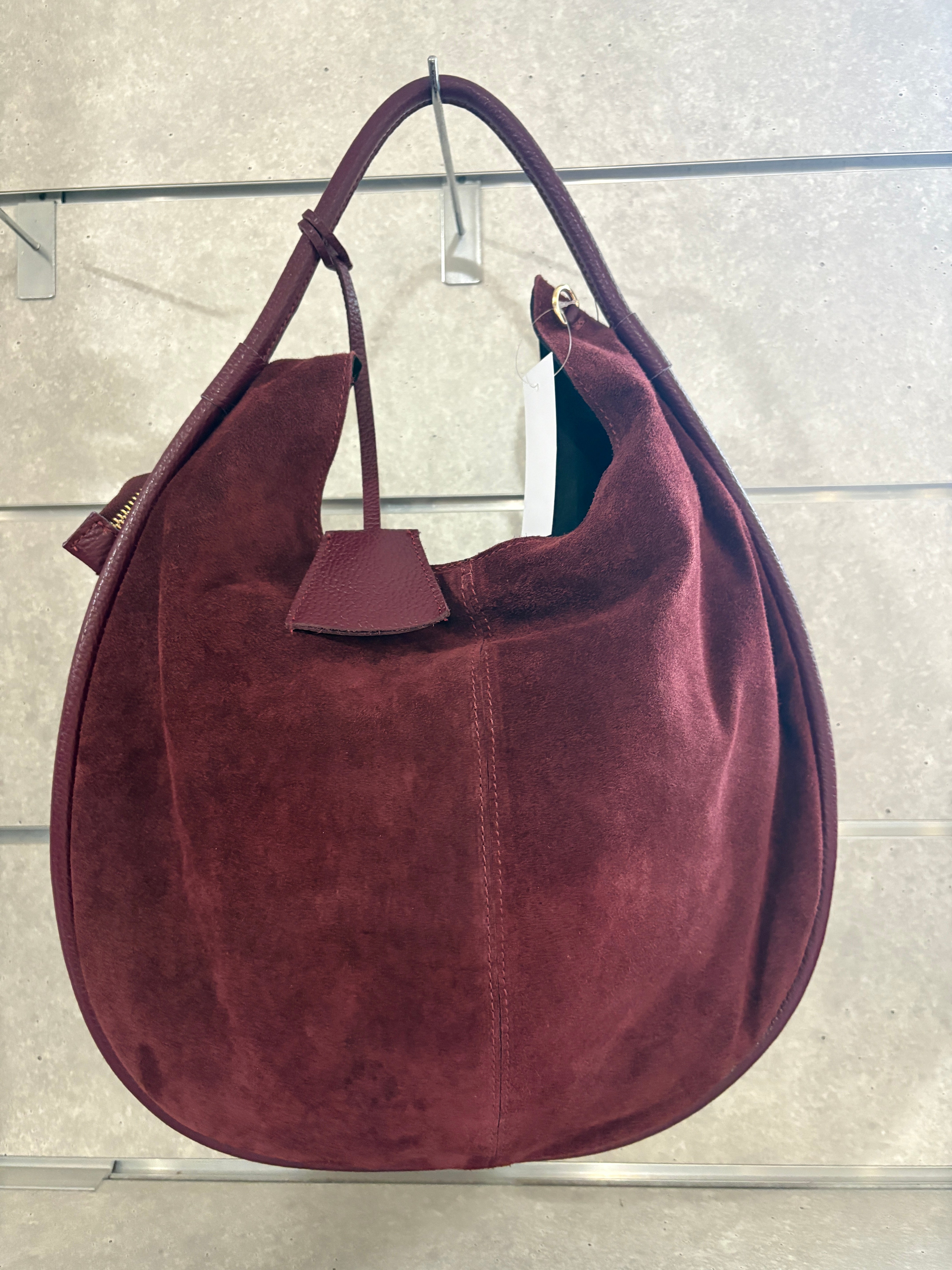 Borsa artigianale in camoscio e pelle di buccia d’arancia
