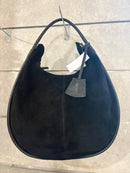 Borsa artigianale in camoscio e pelle di buccia d’arancia