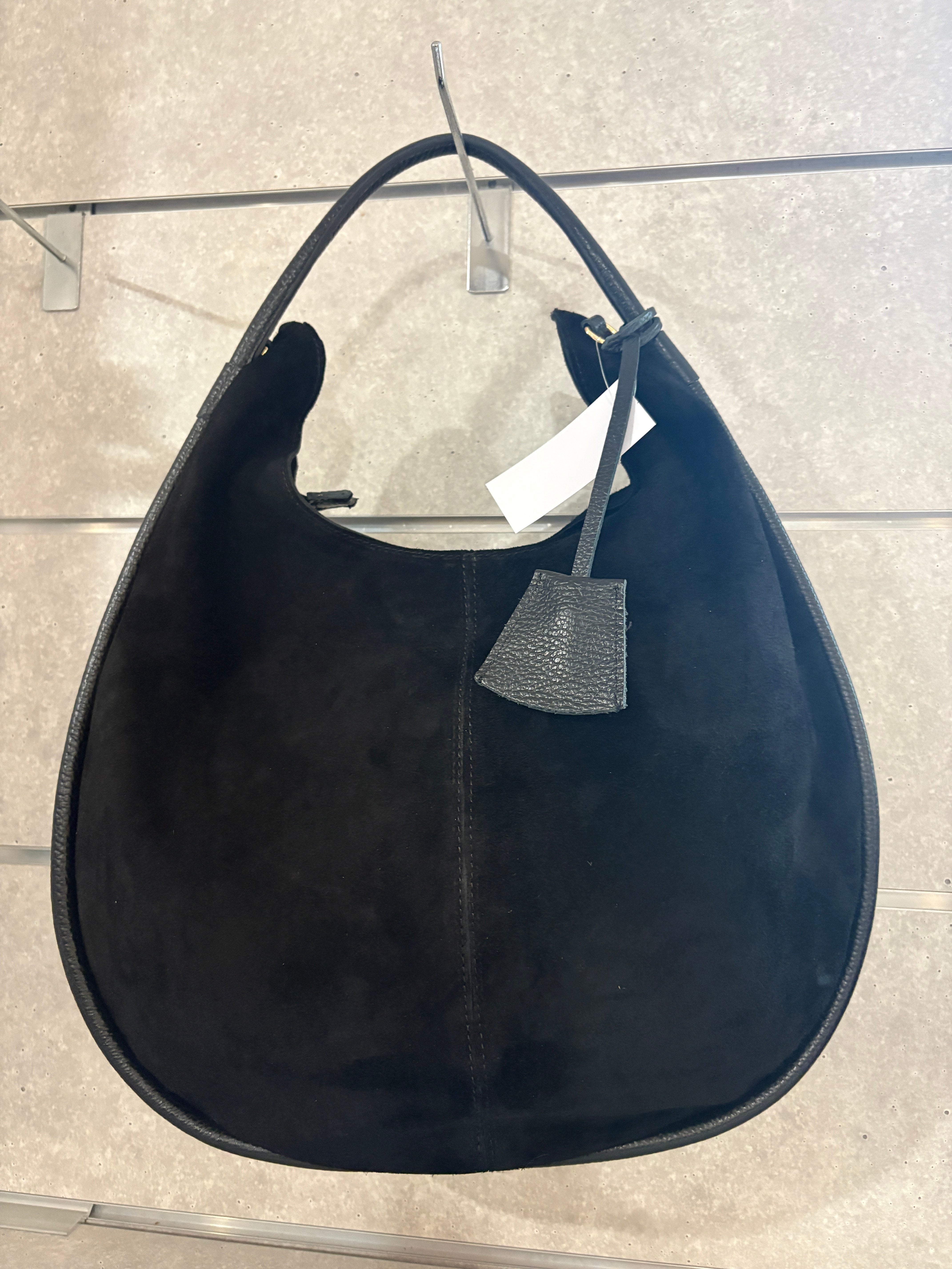 Borsa artigianale in camoscio e pelle di buccia d’arancia