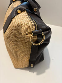 Large woven and leather shoulder bag