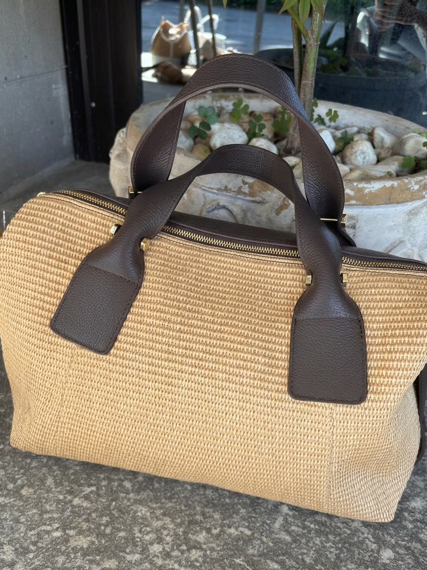 Large woven and leather shoulder bag