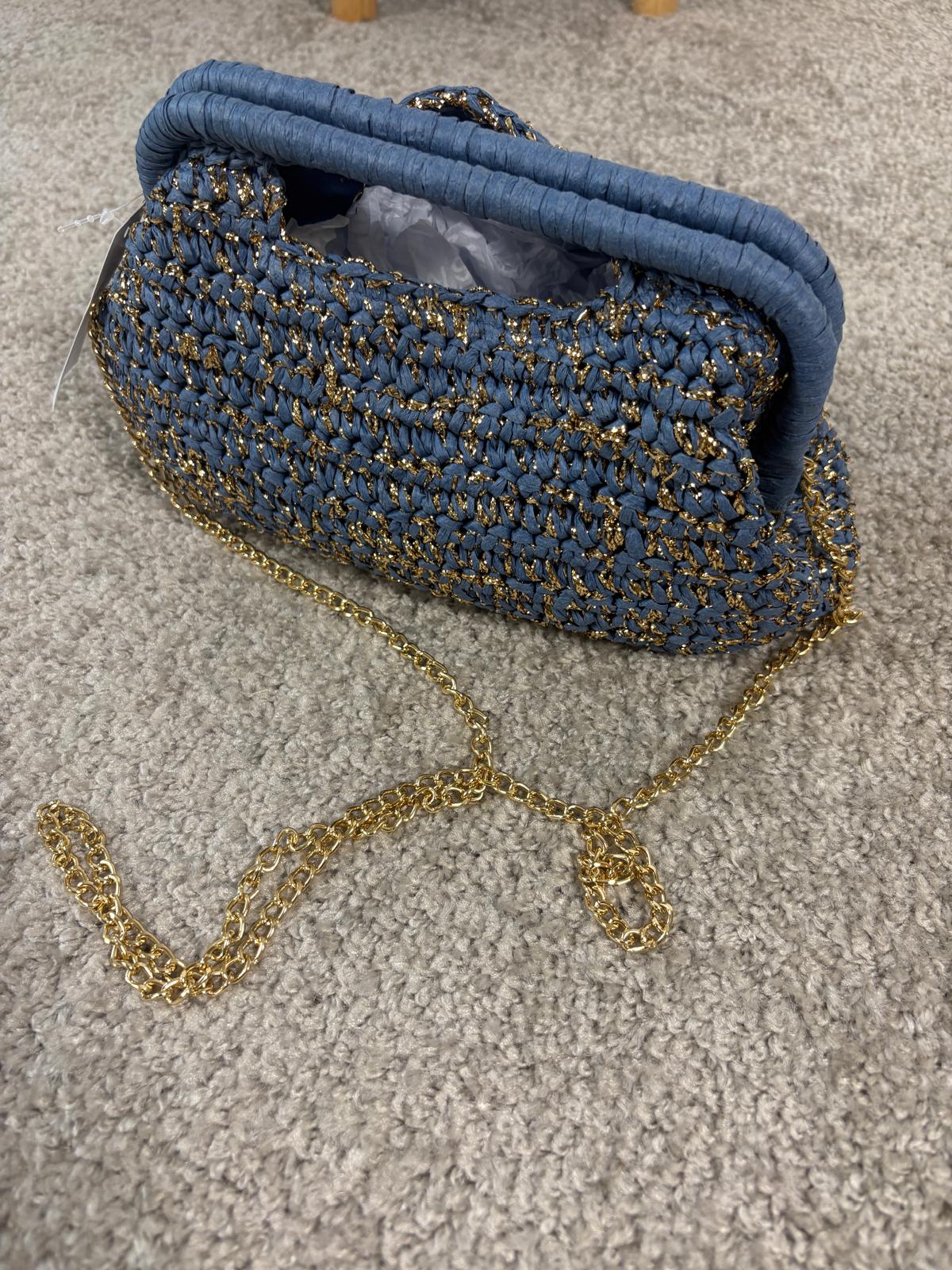 Borsa intrecciata con fili lurex e tracolla a catena
