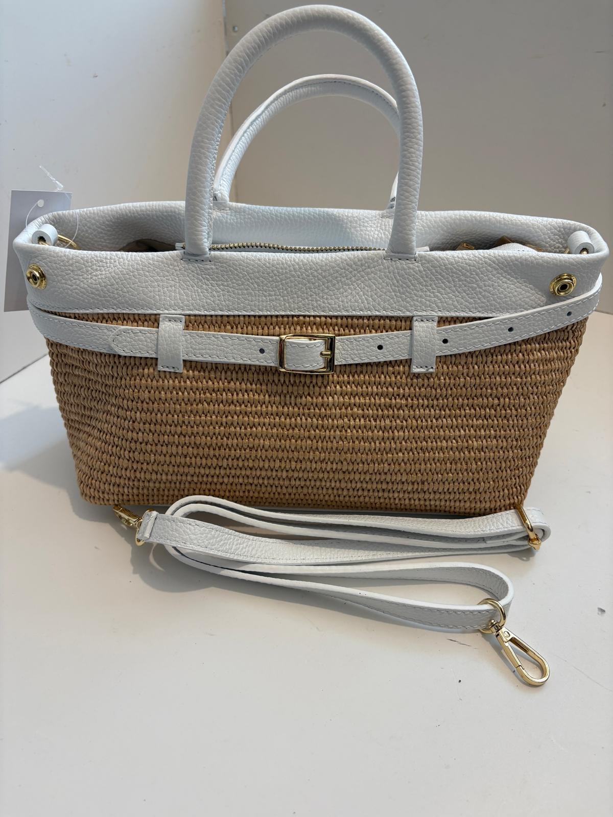 Woven bag with leather handles and shoulder strap