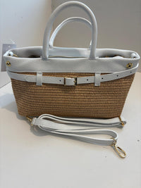 Woven bag with leather handles and shoulder strap