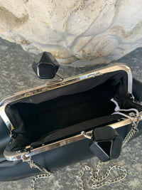 Borsa a mano nera con chiusura gioiello