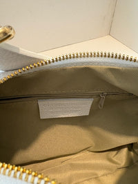 Orange peel effect bag with adjustable handle