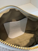 Orange peel effect bag with adjustable handle
