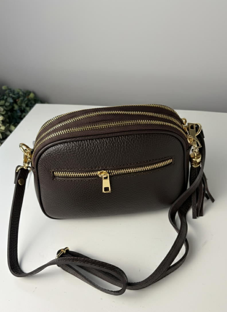 Borsa artigianale in pelle di camoscio e pelle di buccia d'arancia