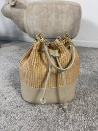 Woven bucket bag with leather details