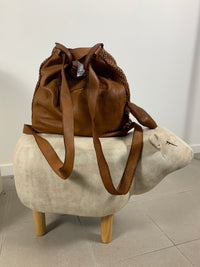 Borsa zaino toscana in pelle intrecciata con manico arricciato
