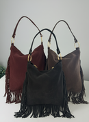 Borsa artigianale in camoscio con frange