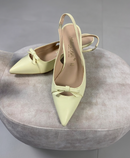 Chanel slingback in ecopelle giallo burro con fiocchetto