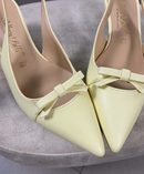 Chanel slingback in ecopelle giallo burro con fiocchetto