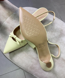Chanel slingback in ecopelle giallo burro con fiocchetto