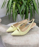 Chanel slingback in ecopelle giallo burro con fiocchetto