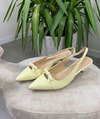 Chanel slingback in ecopelle giallo burro con fiocchetto