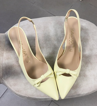 Chanel slingback in ecopelle giallo burro con fiocchetto