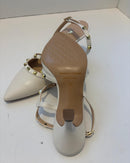 Slingback burro in ecopelle con borchie dorate