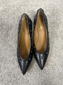 Décolleté Minnie in pelle nera con borchie
