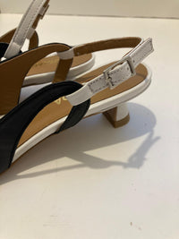 Slingback nera in nappa con cinturino off white