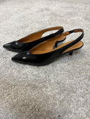 Décolleté slingback in vernice nera