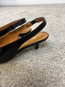 Décolleté slingback in vernice nera
