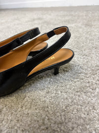 Décolleté slingback in vernice nera