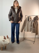 Ecopelliccia reversibile in ecomontone con cappuccio