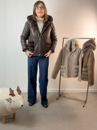 Ecopelliccia reversibile in ecomontone con cappuccio