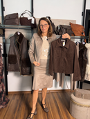 Giacca in ecodainetto con bottoni e tasche applicate