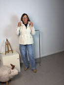 Waterproof butter-colored safari jacket with inner drawstring