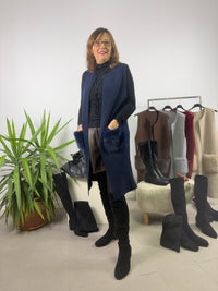 Gilet lungo con tasche in pelliccia