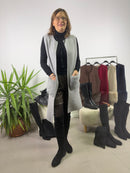 Gilet lungo con tasche in pelliccia