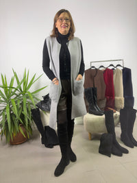 Gilet lungo con tasche in pelliccia