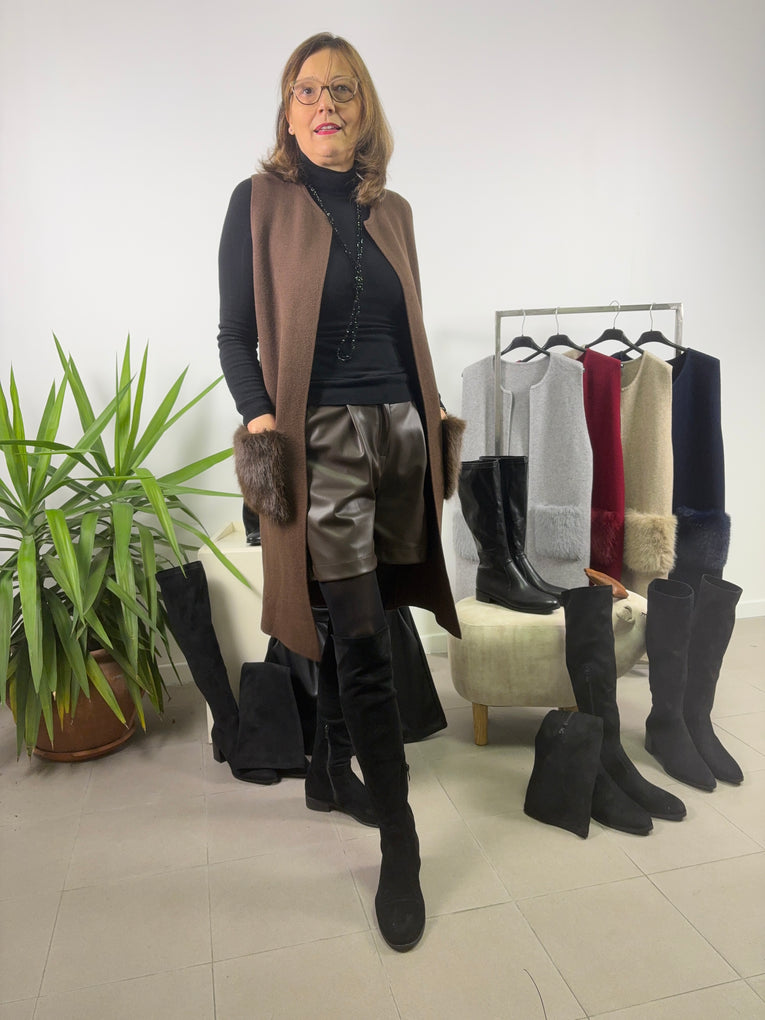 Gilet lungo con tasche in pelliccia