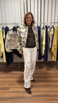 Jeans bianco con ricami traforati gamba dritta