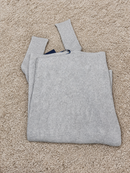 Maglia lunga Blue Joint con taglio sbieco e manica a pipistrello