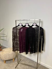Maglia in pizzo elasticizzato a manica lunga