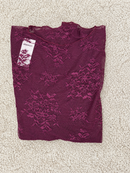 Maglia in pizzo elasticizzato a manica lunga
