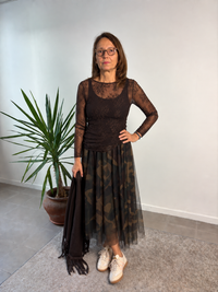 Maglia in pizzo elasticizzato a manica lunga
