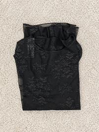 Maglia in pizzo elasticizzato a manica lunga