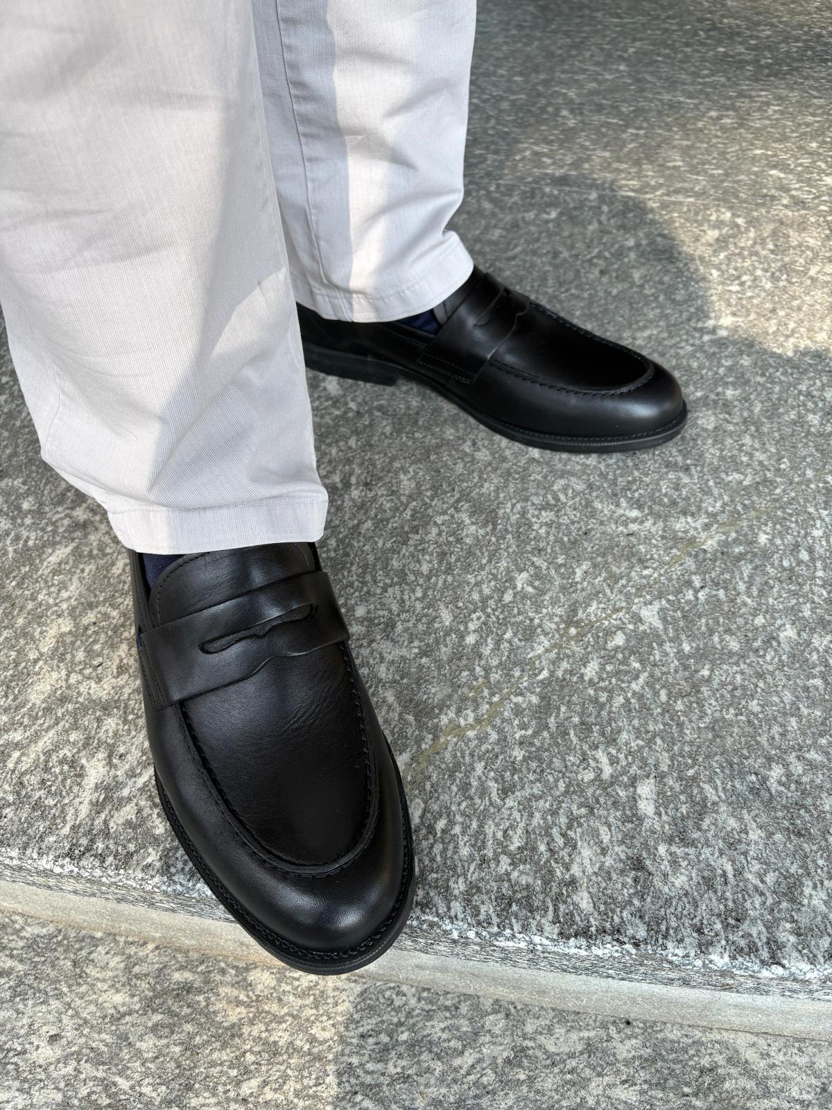 Men's black leather loafers