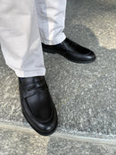 Men's black leather loafers