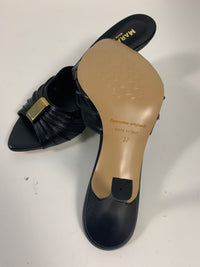 Mules nere in pelle con fibbia oro