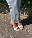Mules in pelle color burro